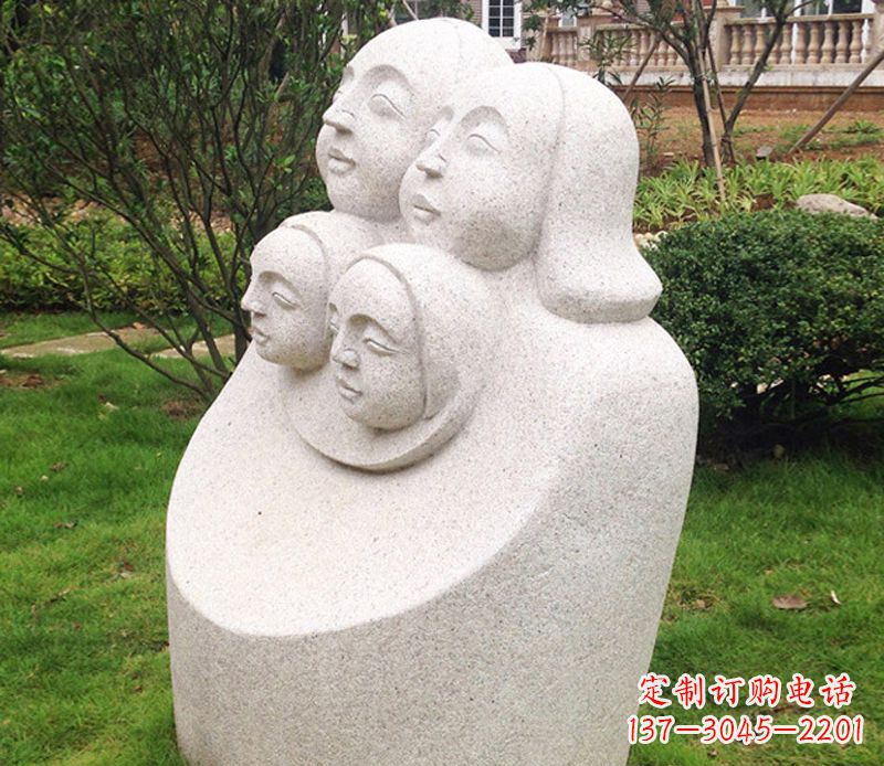 泰安公园母子人头像石雕