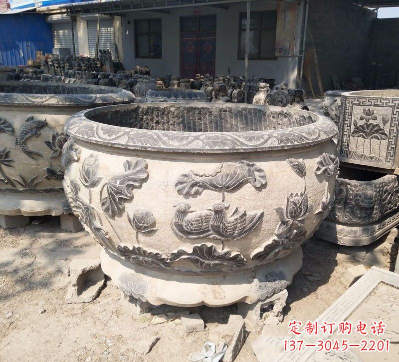 泰安荷花鸳鸯浮雕石水缸