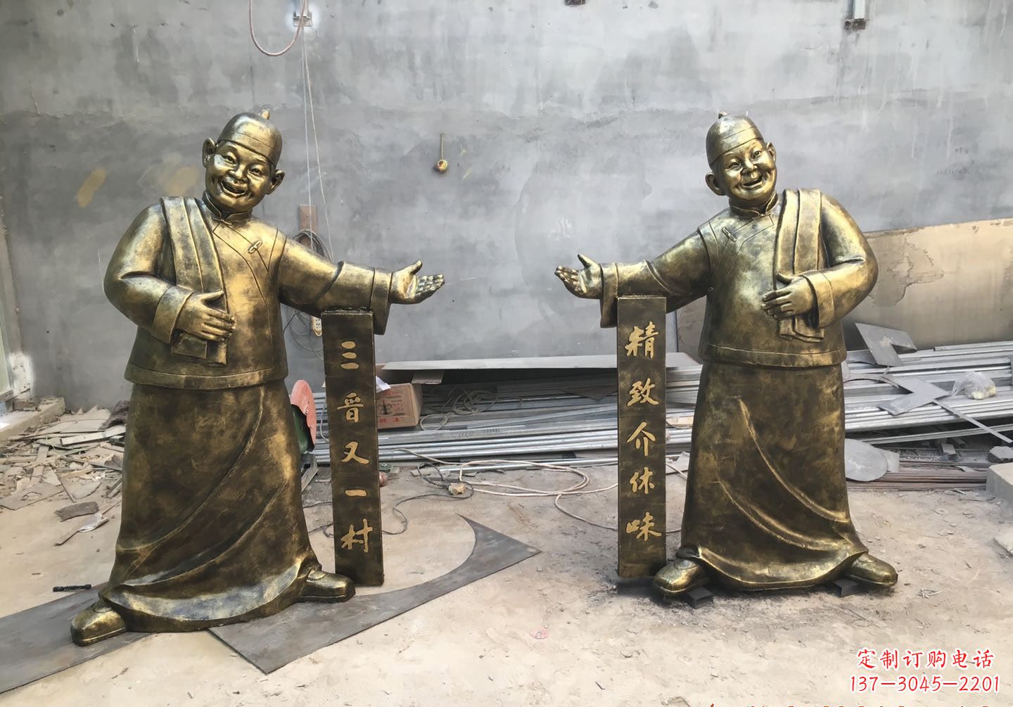 泰安中领雕塑:酒店门口店小二人物铜雕