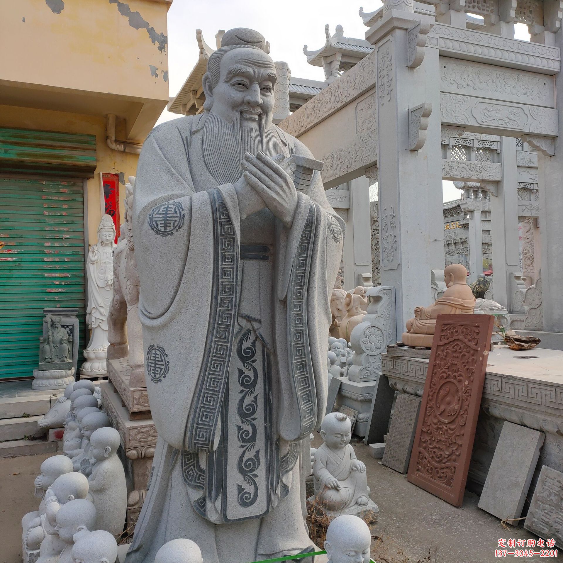 泰安孔子问礼石雕塑像
