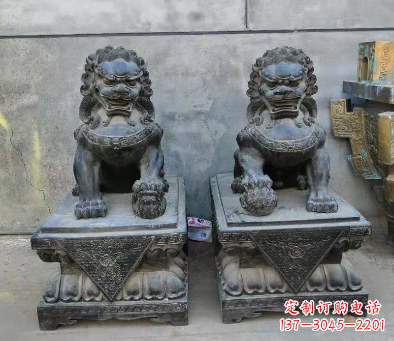 泰安门口踩球狮子铜雕