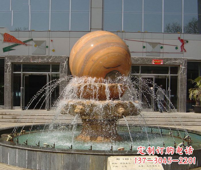 泰安石来运转球晚霞红风水球石雕