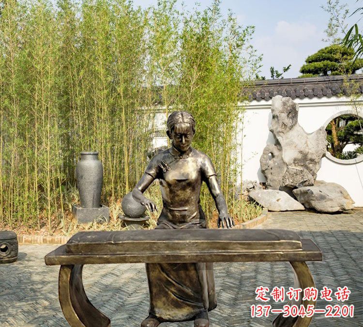 泰安铜雕弹古筝人物