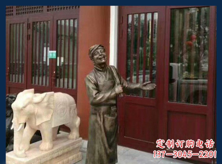 泰安铜雕店小二酒店迎宾人物雕塑