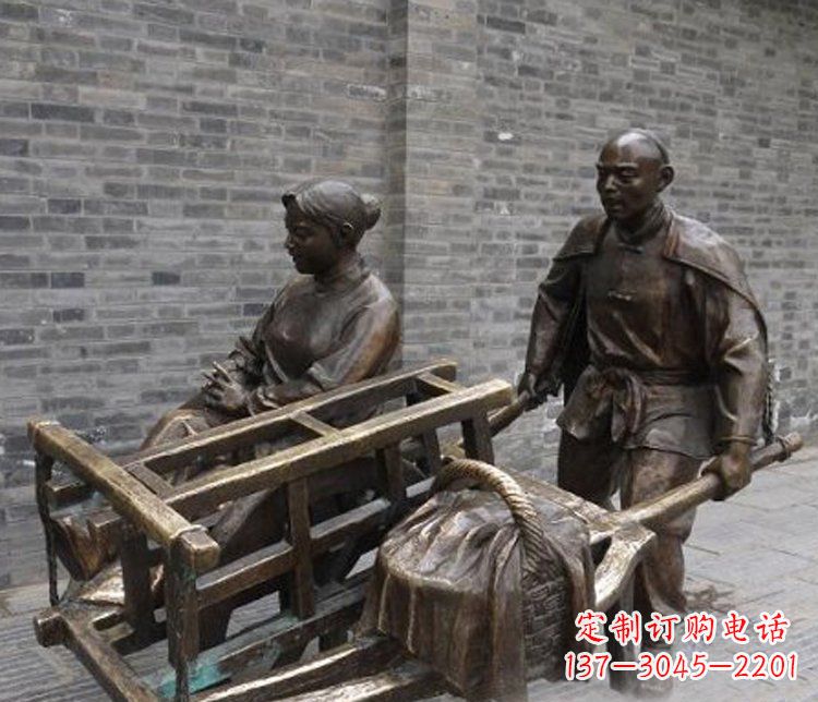 泰安推独轮车的人物铜雕