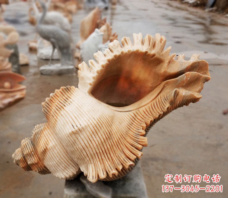 泰安晚霞红海螺石雕广场景观雕塑