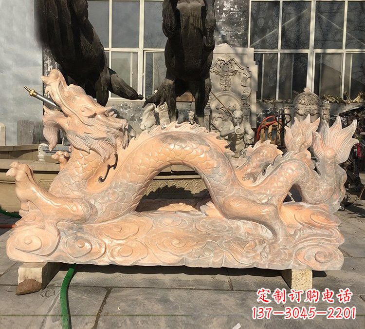 泰安晚霞红石雕喷水龙