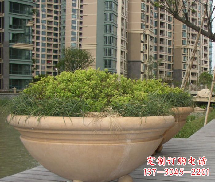 泰安小区景观晚霞红花盆石雕