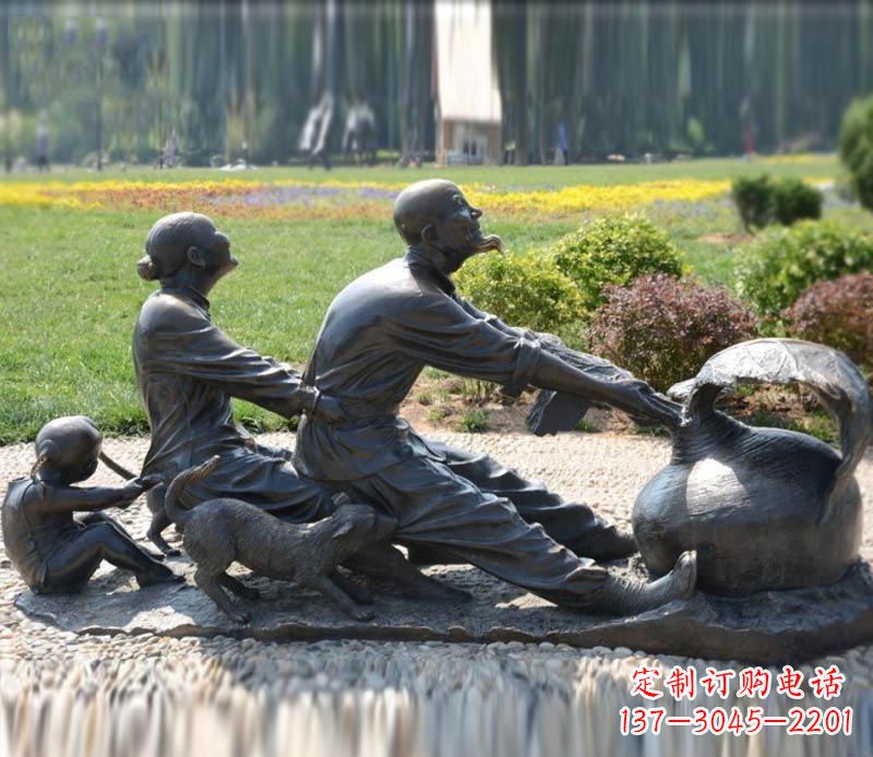 泰安祖孙三人拔萝卜铜雕